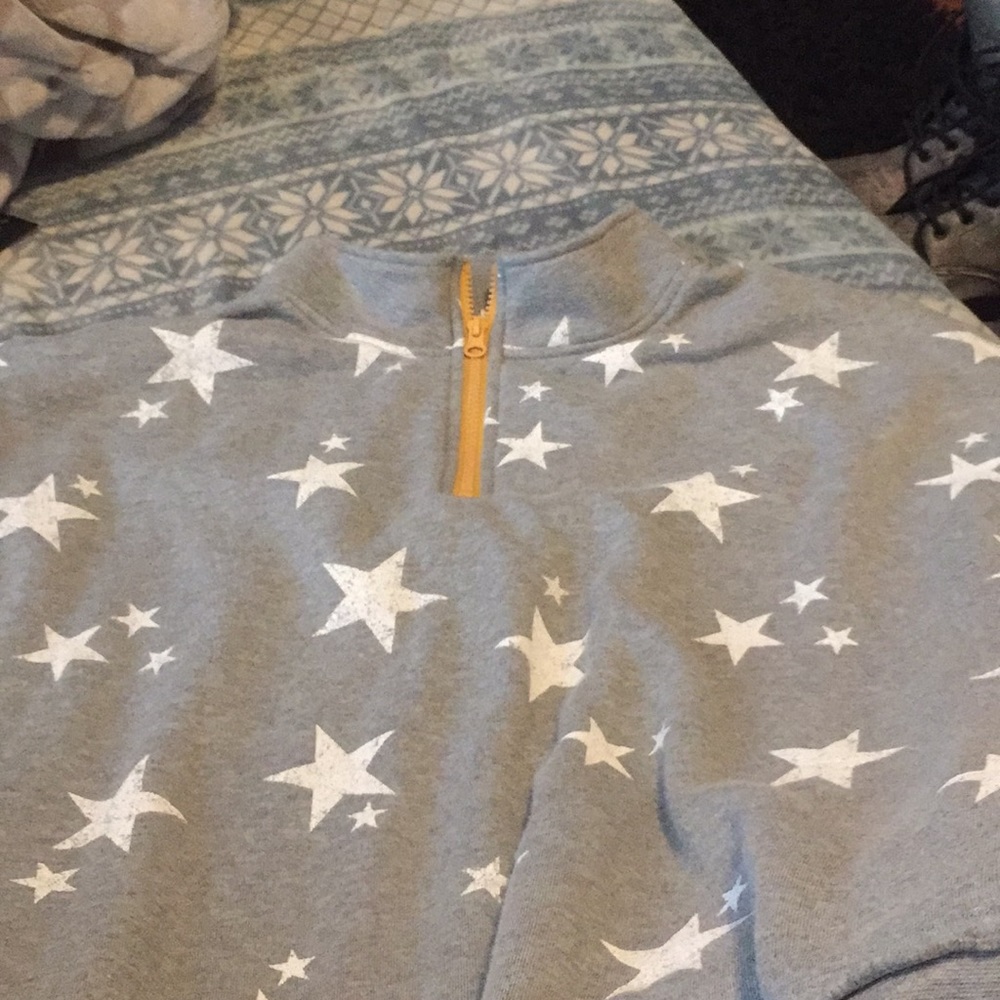 Never worn!  Star covered long sleeved hoodie